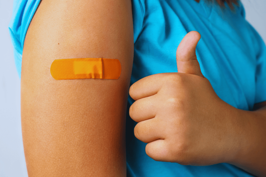 immunization band aid thumbs up