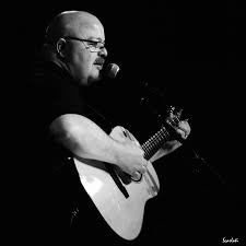 man holding a guitar