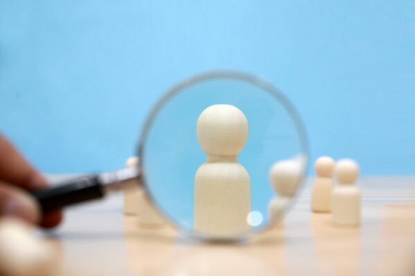 Magnifying glass over a game piece