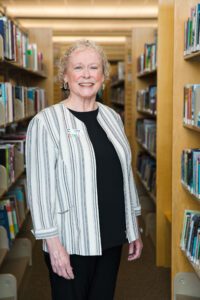 woman smiling in the library