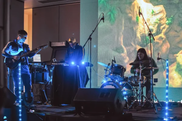 Photo of the band Extra Lives performing